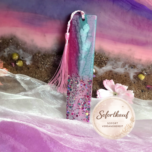 Alternativtext (Alt-Text): Handgefertigte Lesezeichen aus Epoxidharz mit edlen Glitzer-Details und Pigmenten – Unikate von Traumharz.